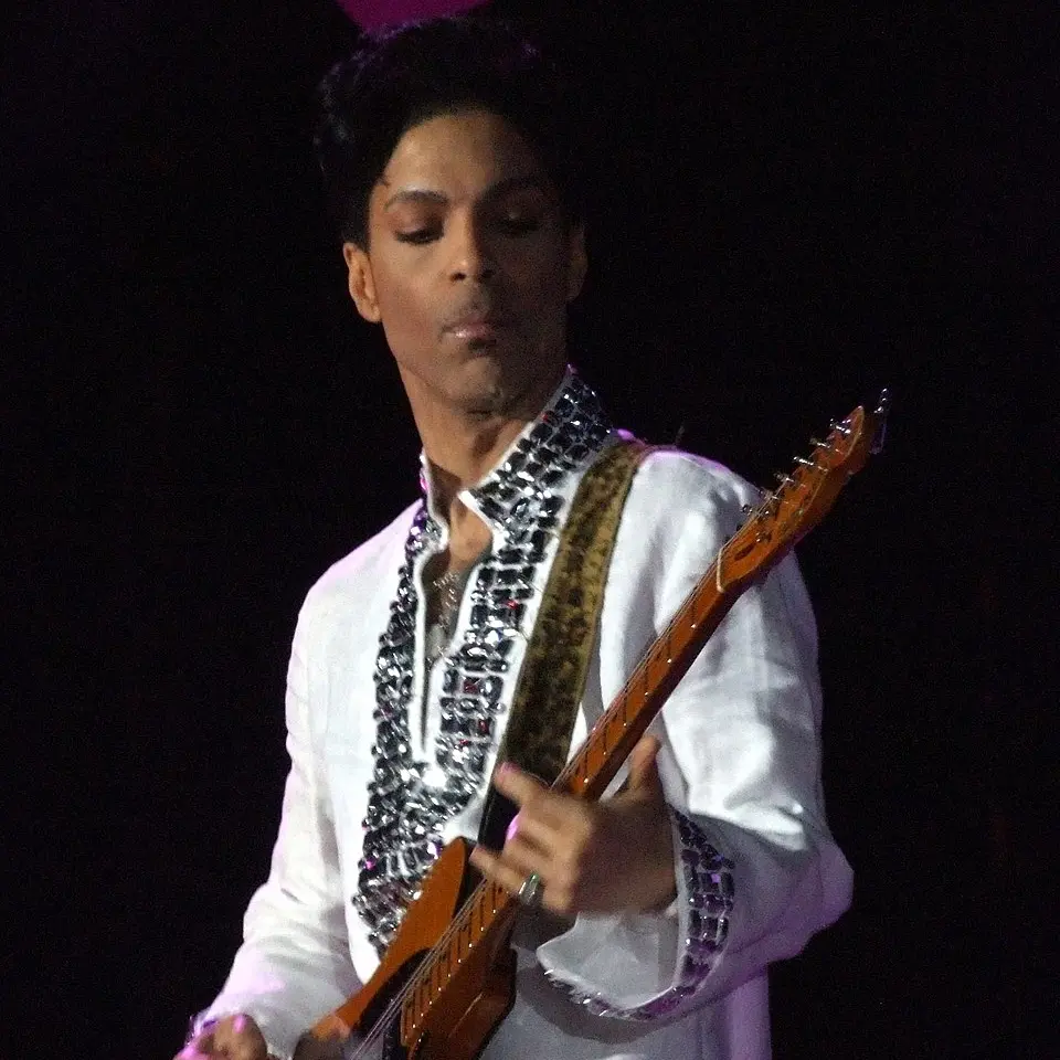 Jimmy Iovine in studio Prince playing guitar on stage